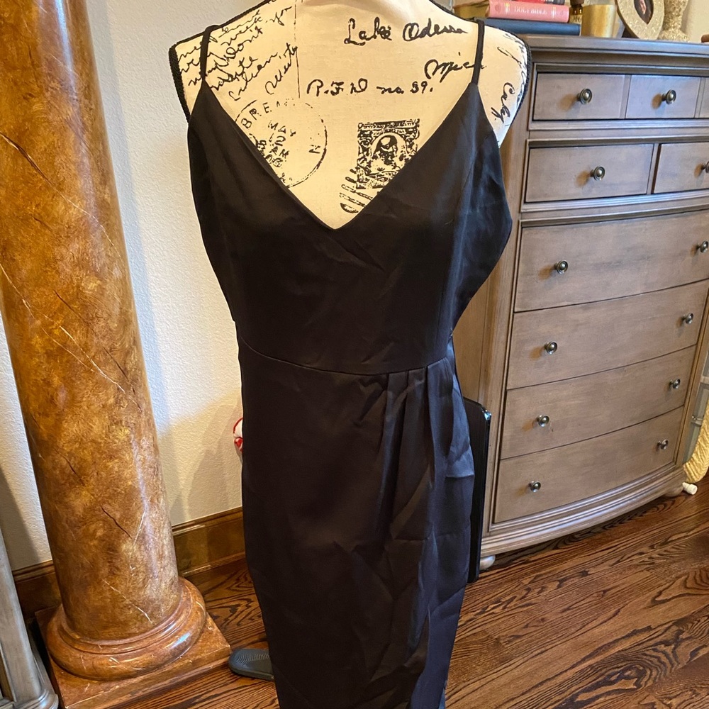 Gorgeous tulip hem dress. The mannequin does not do it Justice. Date night gem!